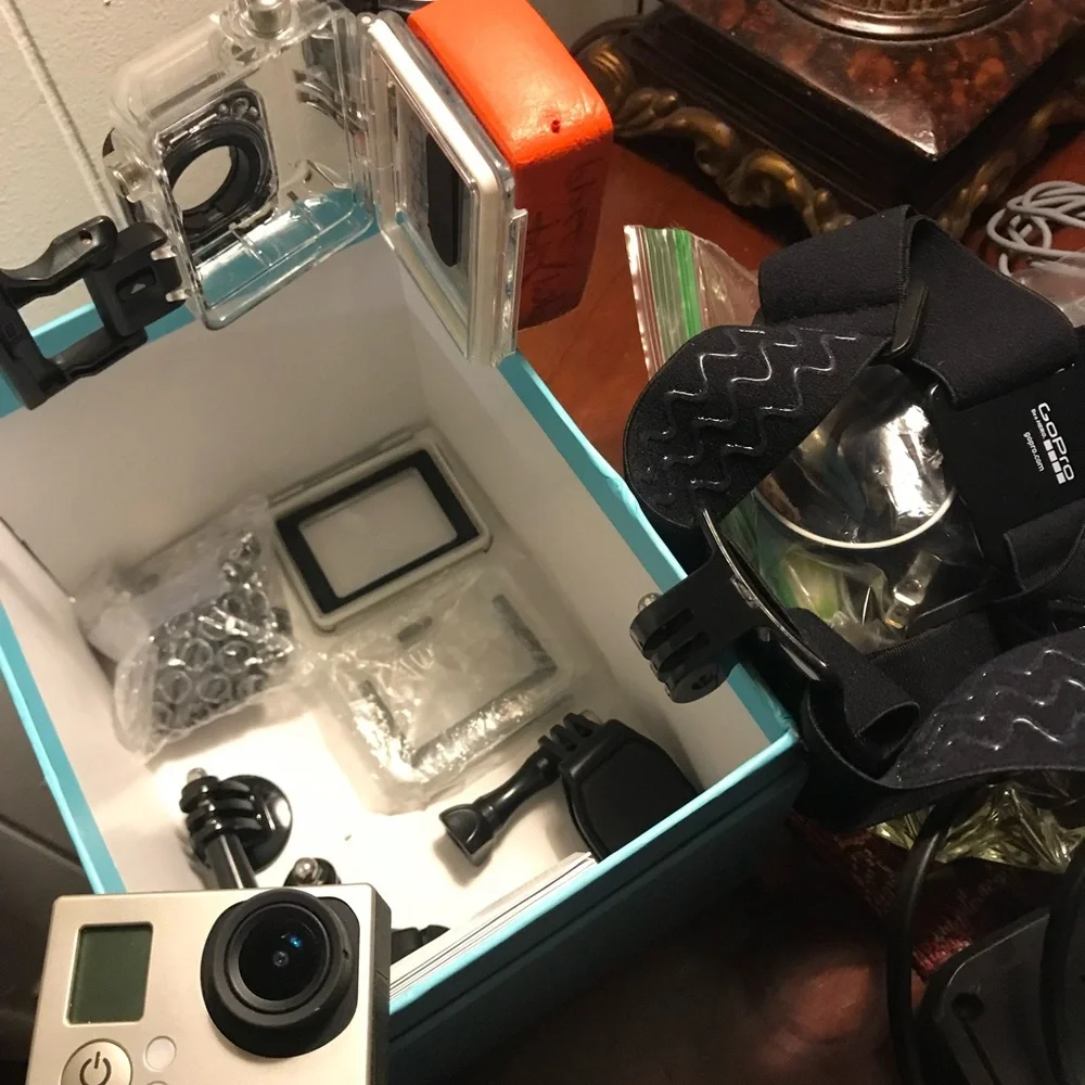 GO PRO HERO ACTION CAMERA W/LOADS OF ACCESSORIES. Some never used, see all pics.